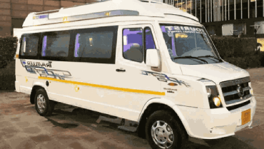 White tempo traveller parked in a residential neighbourhood in mumbai suburbans