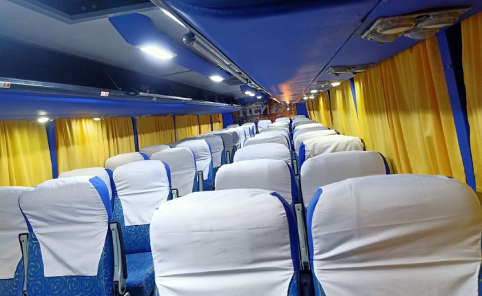 40 seater bus with blue curtains