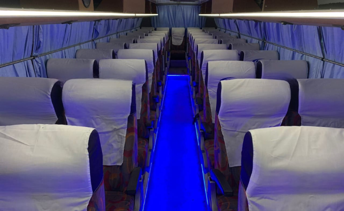 Prime 40 seater bus with blue curtains